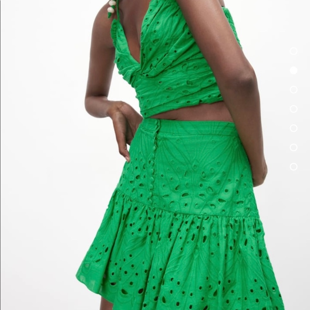 Open work embroidered top and ruffle embroidered skirt